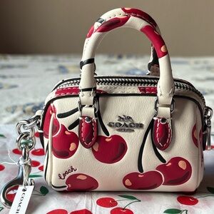 🍒 COACH MINI ROWAN SATCHEL BAG CHARM WIITH CHERRY PRINT 🍒 NWT 🍒
